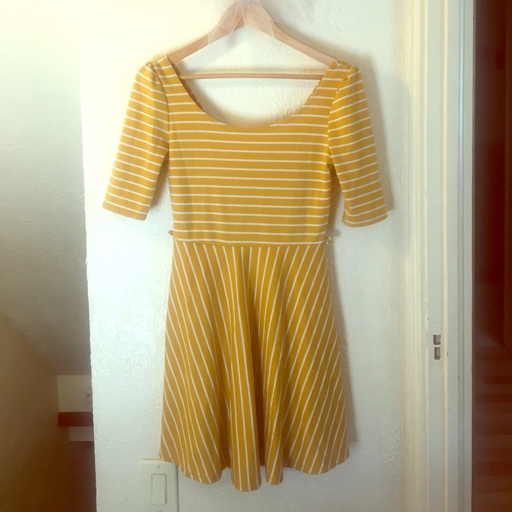 Yellow, striped dress. Size medium.