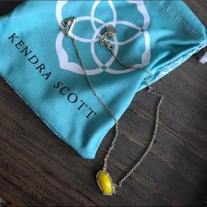 Elisa necklace gold with yellow stone.