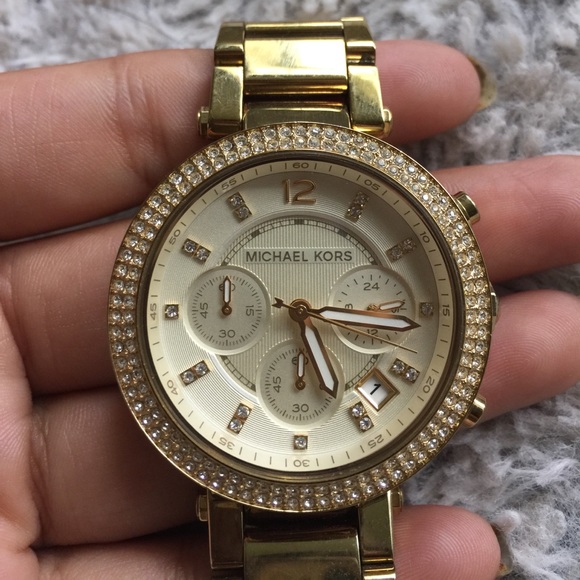 MK gold watch