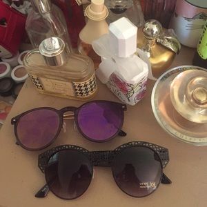 Two pairs of brand new sunglasses