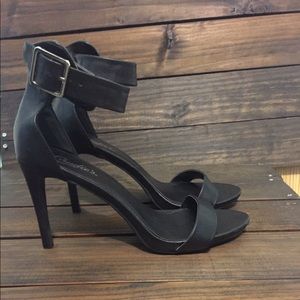Candie's black ankle strap stilettos