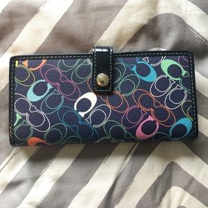 Brand new! Coach checkbook cover navy + multi Cs
