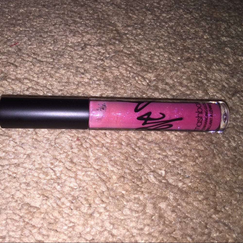 Brand new Smash Box Lip gloss in pink color.