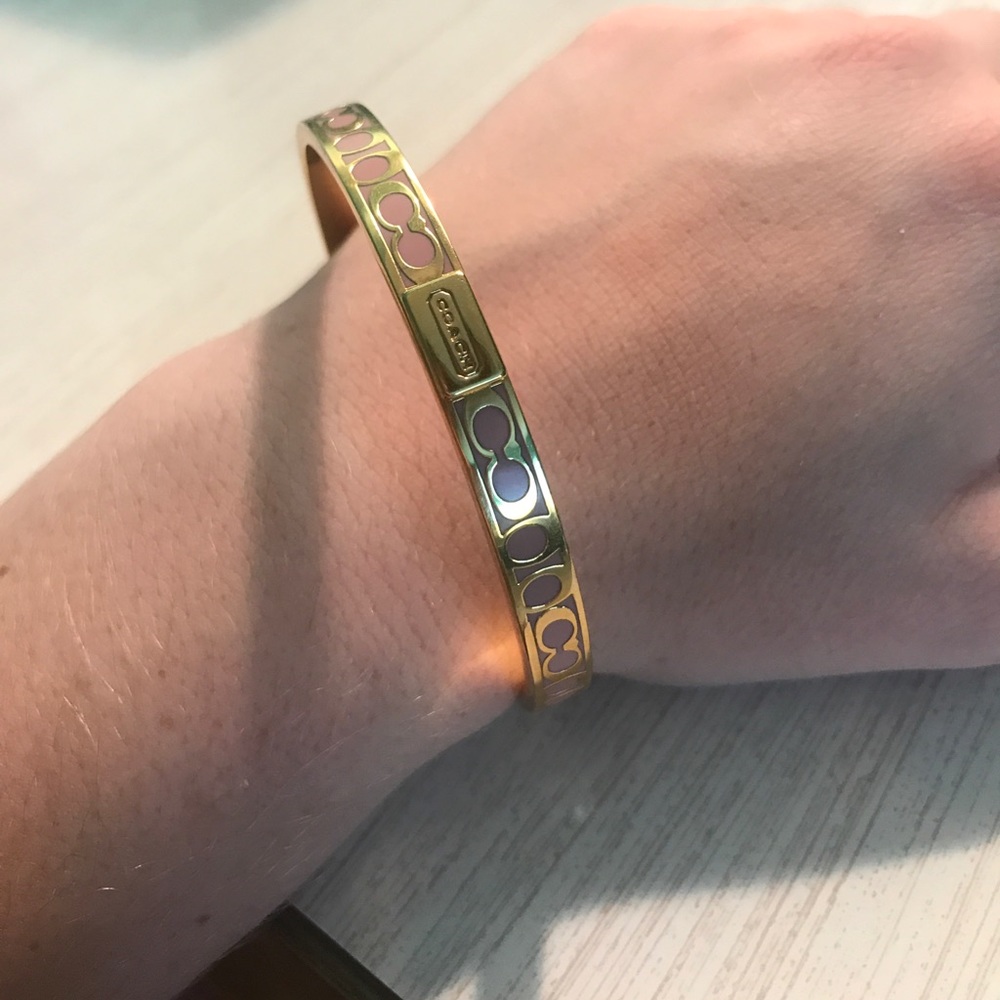 coach gold and pink bracelet