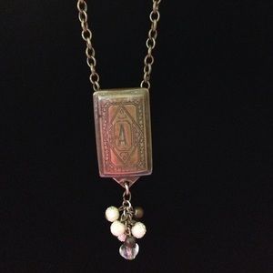 Upcycled and repurposed necklace. Monogrammed A