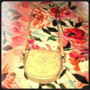 A beautiful hanging from the shoulder purse