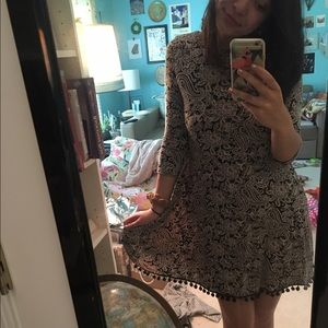 Black and Tan Boohoo dress with Pom-Pom hem