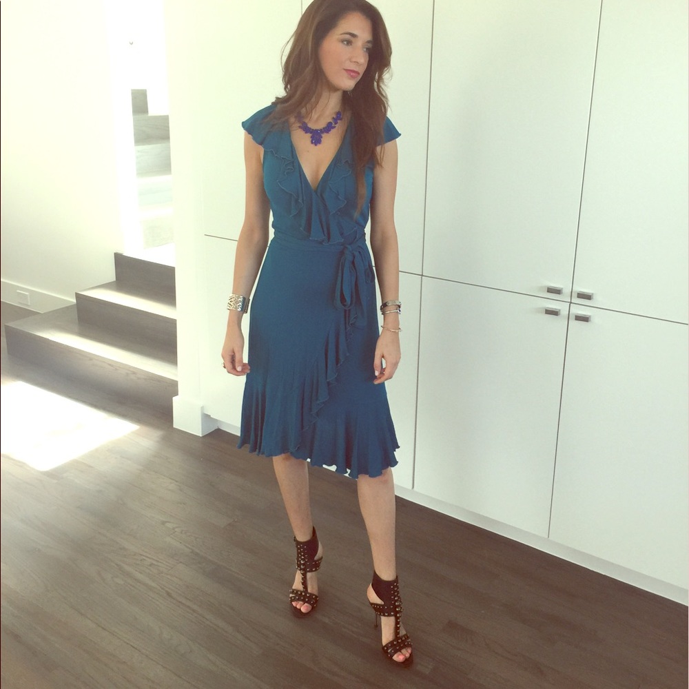 Diane Von Furstenberg wrap dress in teal.