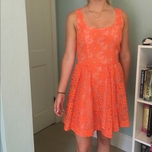 Coral dress with flower pattern