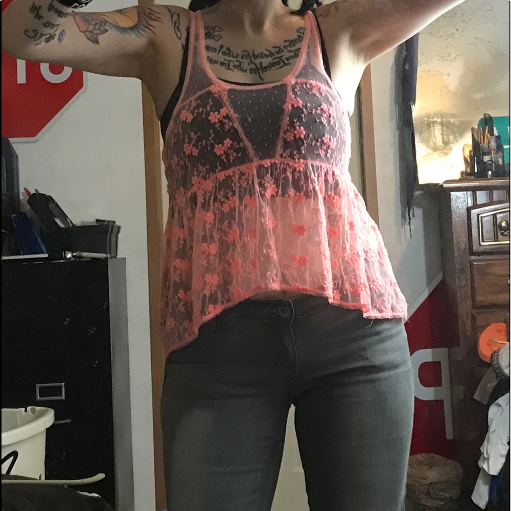 This is a super cute sheer Lacey tank!!