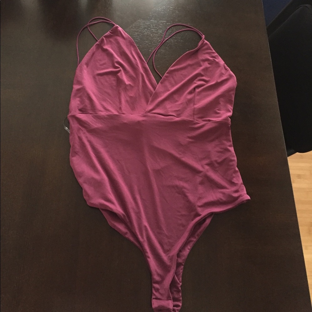 Brand new with tags purple bodysuit