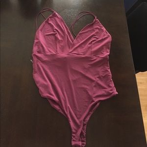 Brand new with tags purple bodysuit