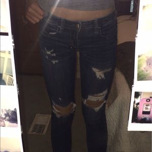 Medium wash mid waist American Eagle ripped jeans