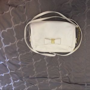 White cross body purse with bow detail