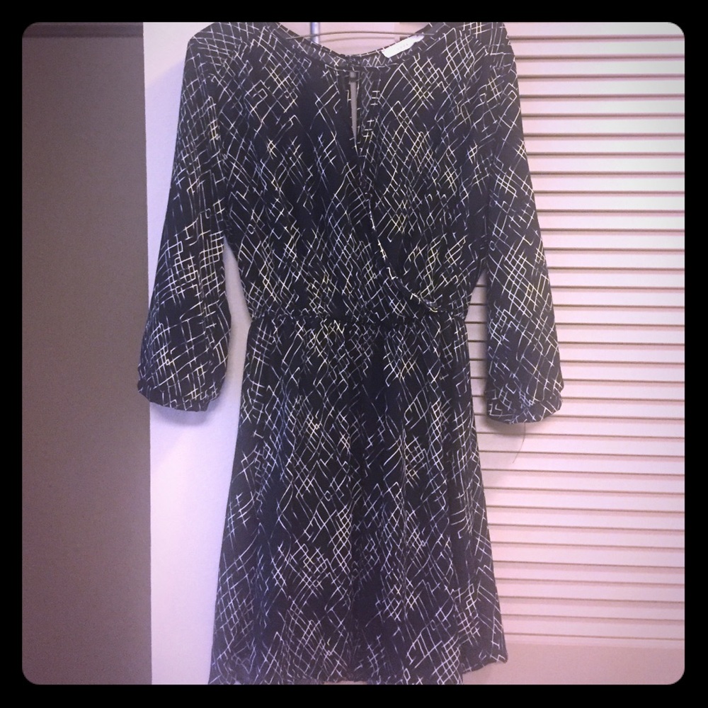 Lush Dress, slightly open back, cinched waist.