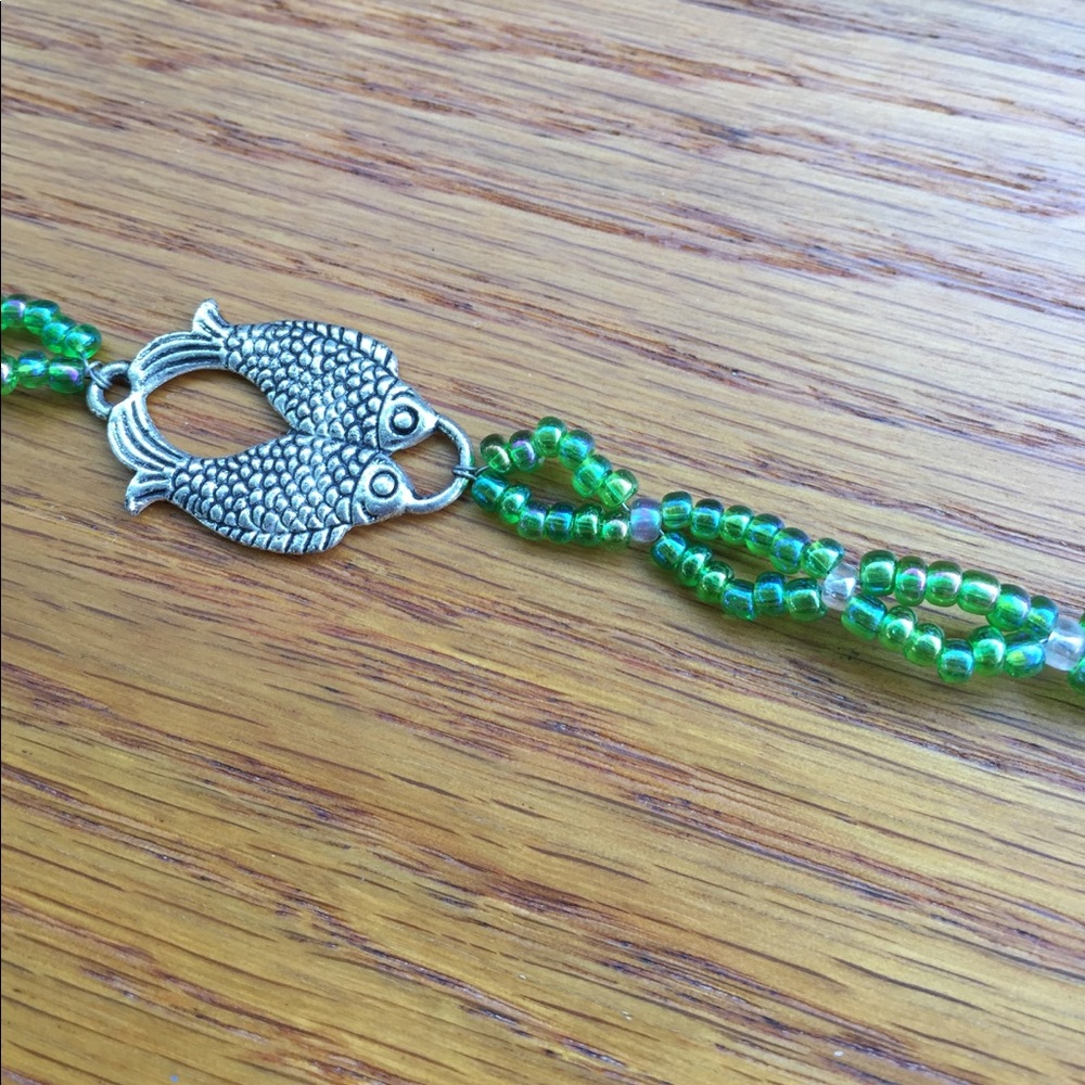 Beaded bracelet with fish charm