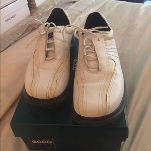 White/ tan golf shoes