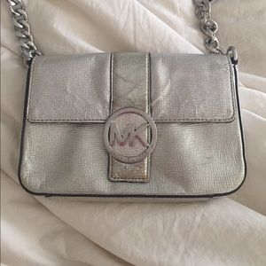 Michael Kors silver cross body bag.