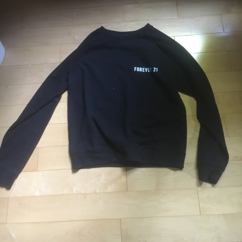 Black "FOREVER 21" jersey-like sweater