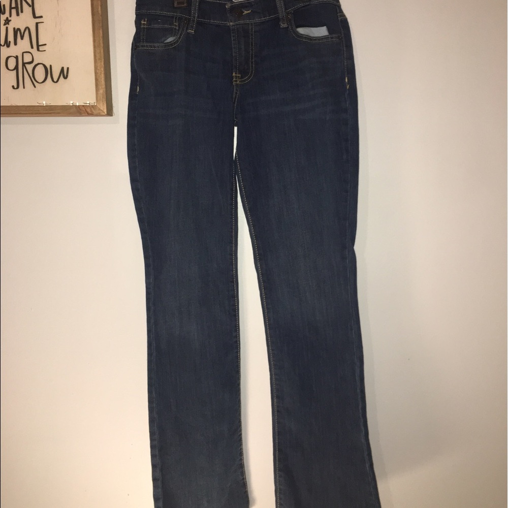 Boot-cut dark complected jeans