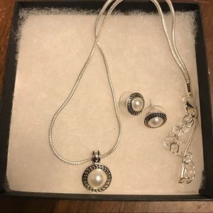 Faux pearl necklace and earrings set.