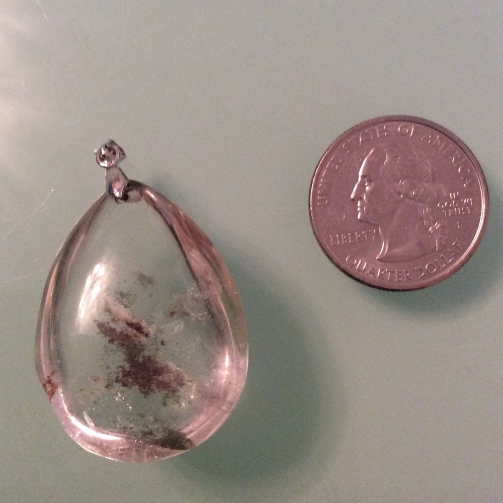 Crystal pendent with purple and green