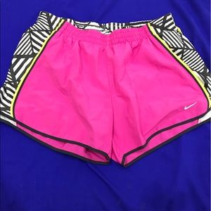 Pink Nike women's running shorts