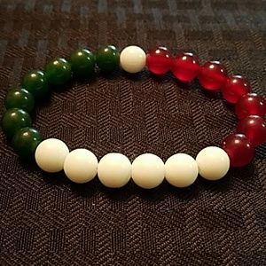 Green, red, and white jade bracelet
