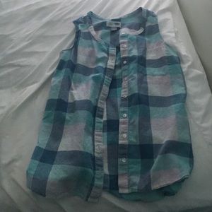 A plaid tank top shirt that is a great summer look