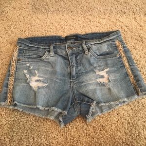 Bebe Jean Shorts with faux snake skin sides