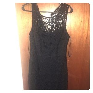 Black dress with lace top and bottom cutouts