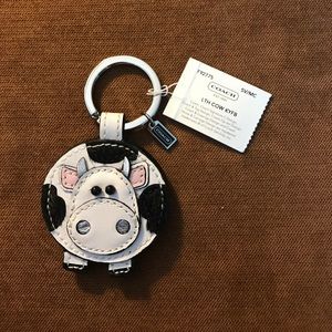 Coach cow keychain.