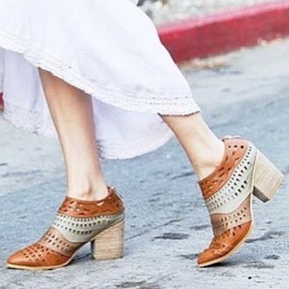 Urban Outfitters Shoes - Pointy Toe Laser Cut Distressed Ankle Booties
