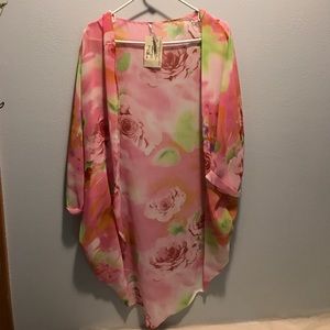 Roses on pink sheer open tunic.