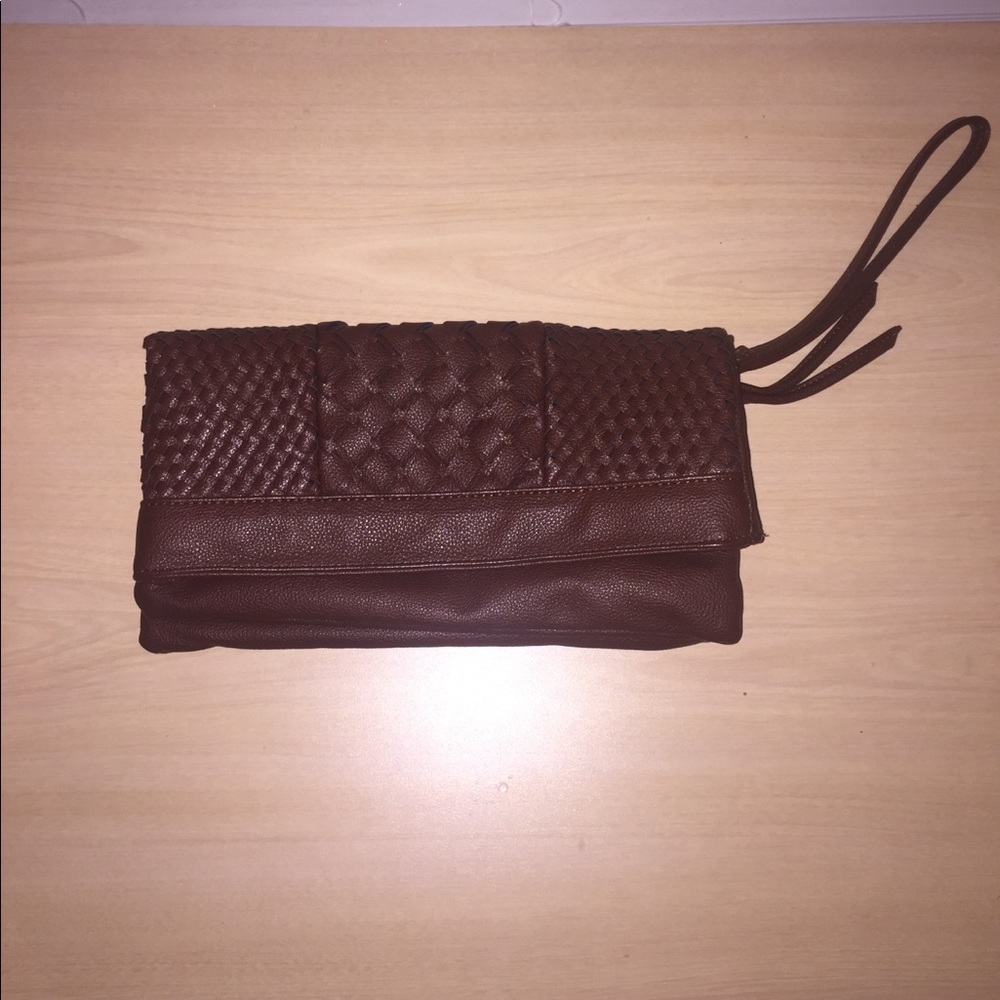 Brown wristlet with three compartments