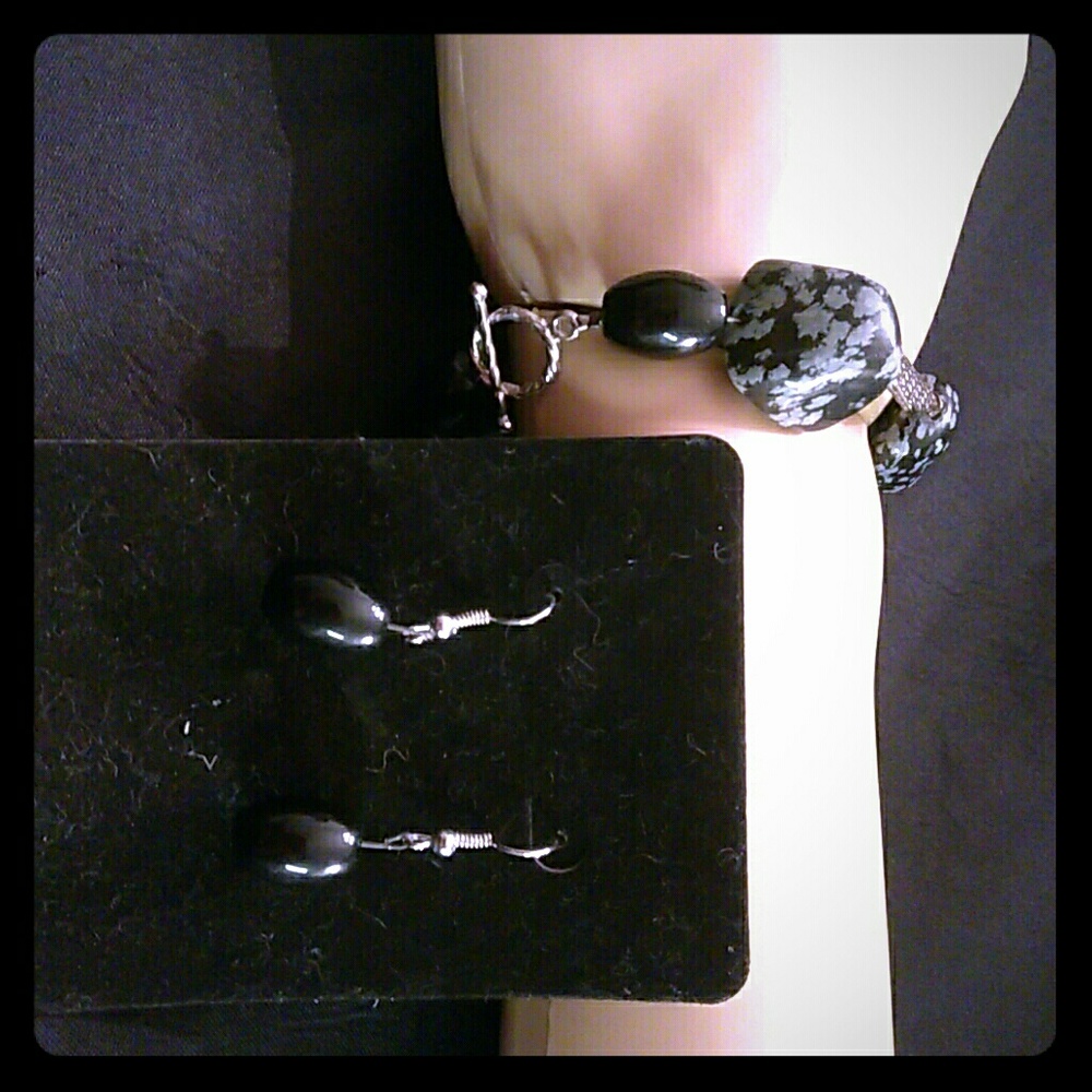 Metal and stone bracelet with matching earrings