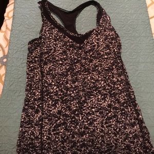 Very cute tank. Gently used. Inside shelf bra