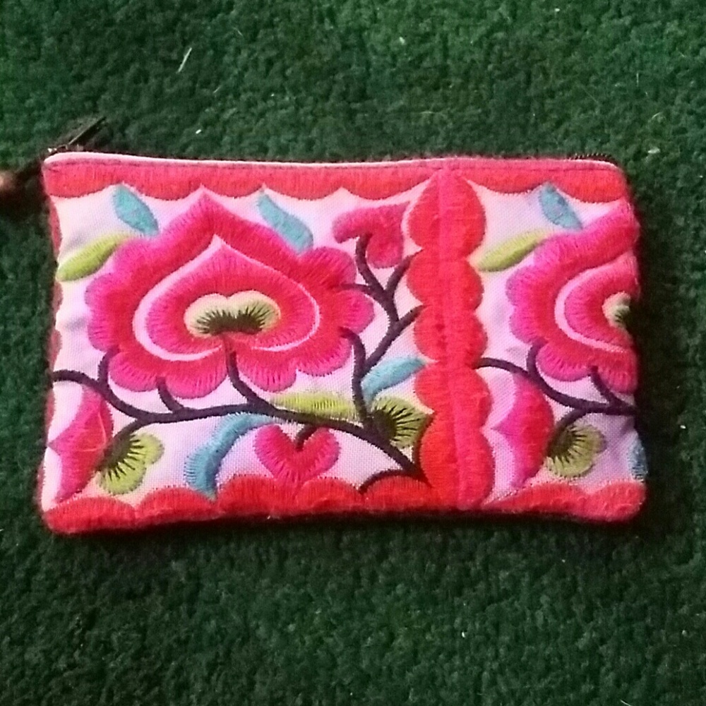 Coin purse with hand stitching