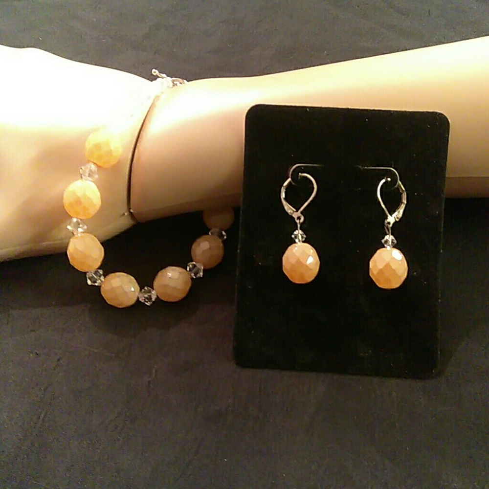 Bracelet with Peach and clear crystal beading.