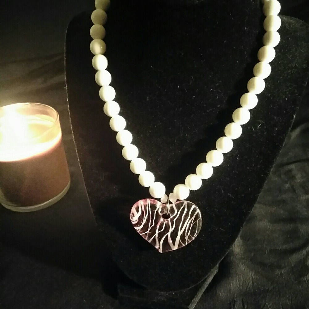 White beaded heart necklace.