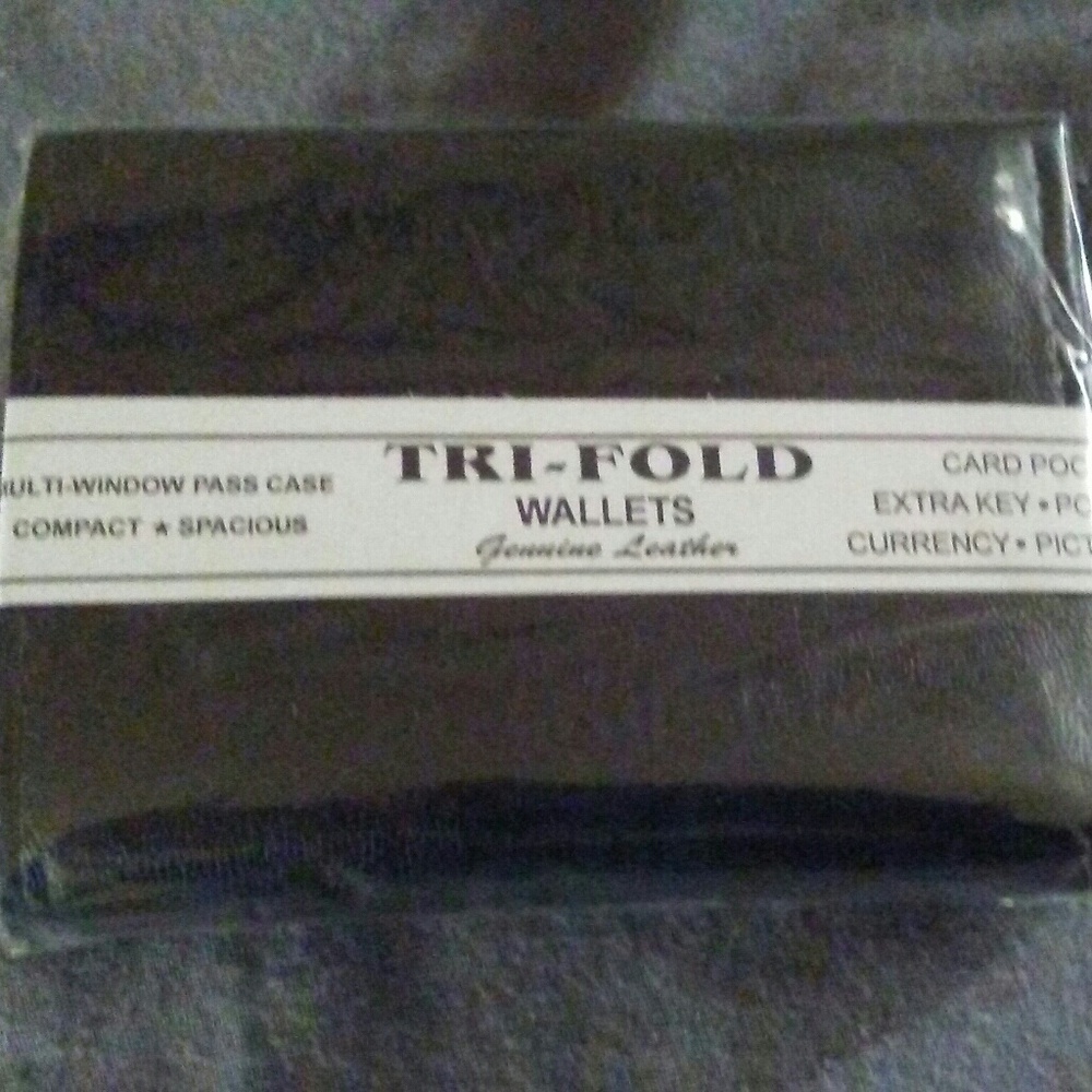 Genuine Leather tri-fold wallet new with tags