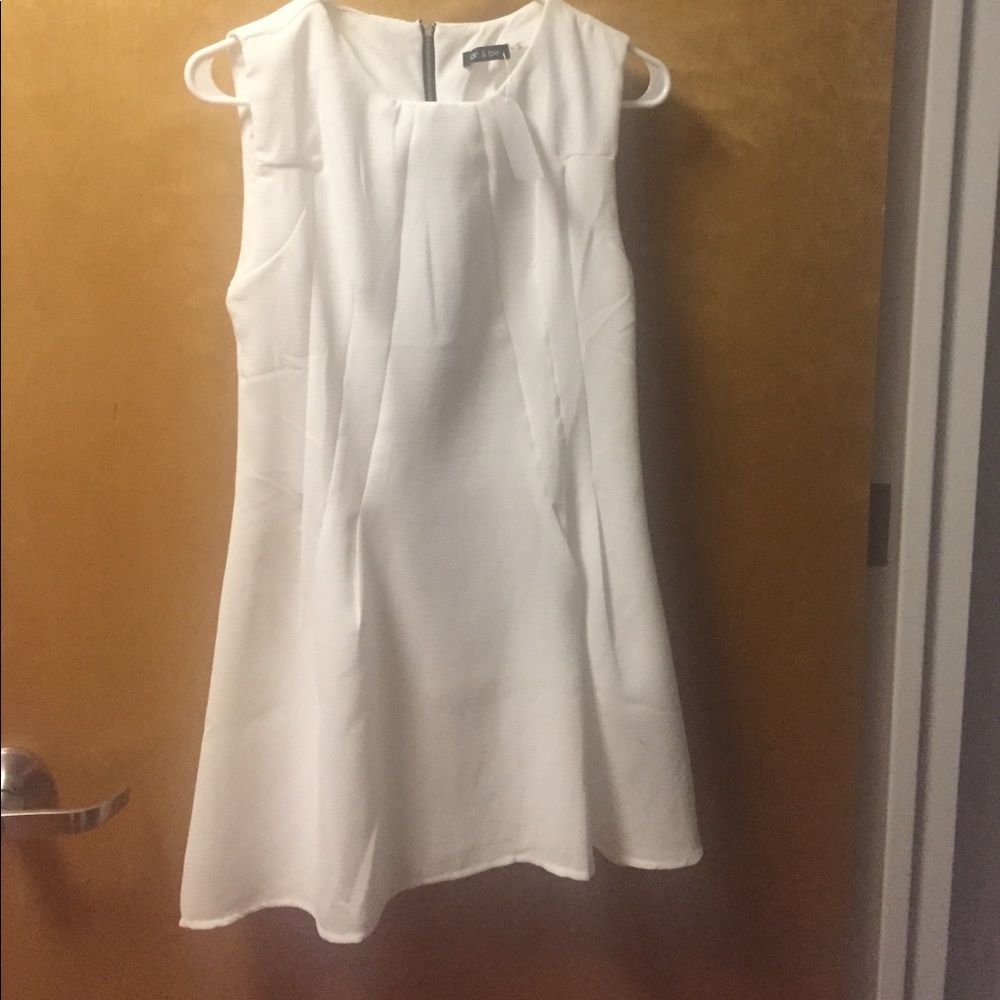 Brand new white mini dress never worn with tags