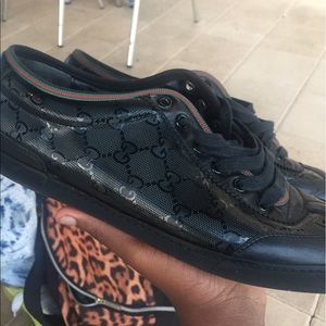 Black Gucci monogram lace up sneakers