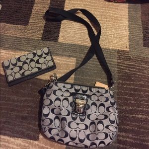 Black cross body coach bag with checkbook cover