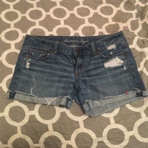 Destroyed denim shorts