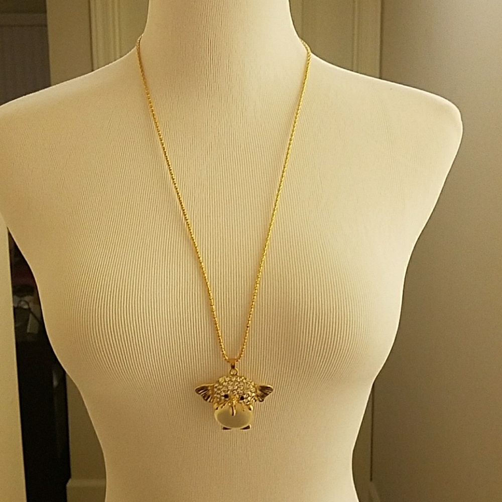 Gold necklace with a baby elephant rionston