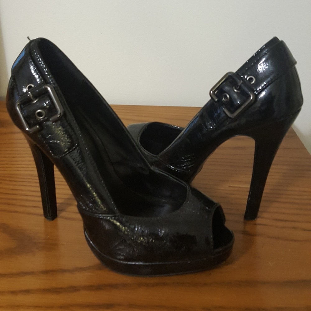 Black Patent leather peep-toe pumps. Size 7