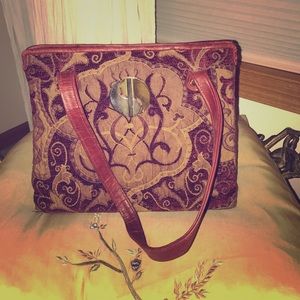 Vintage burgundy tapestry and leather purse.