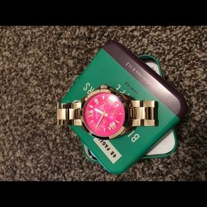 Pink and gold fossil watch