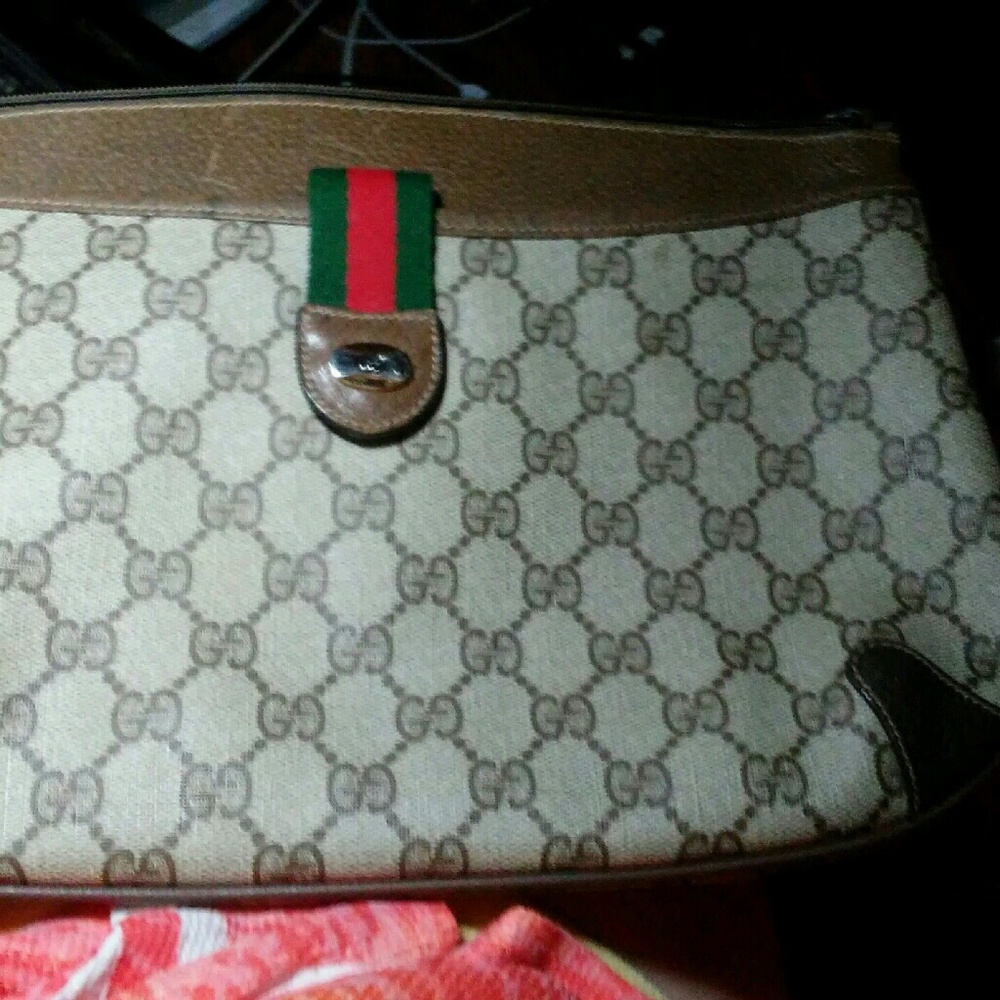 Gucci clutch with strap